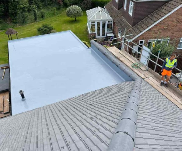 This is a photo of a newly installed hip roof, with a combined liquid covered flat roof. Work carried out by KAM Roofing Askern